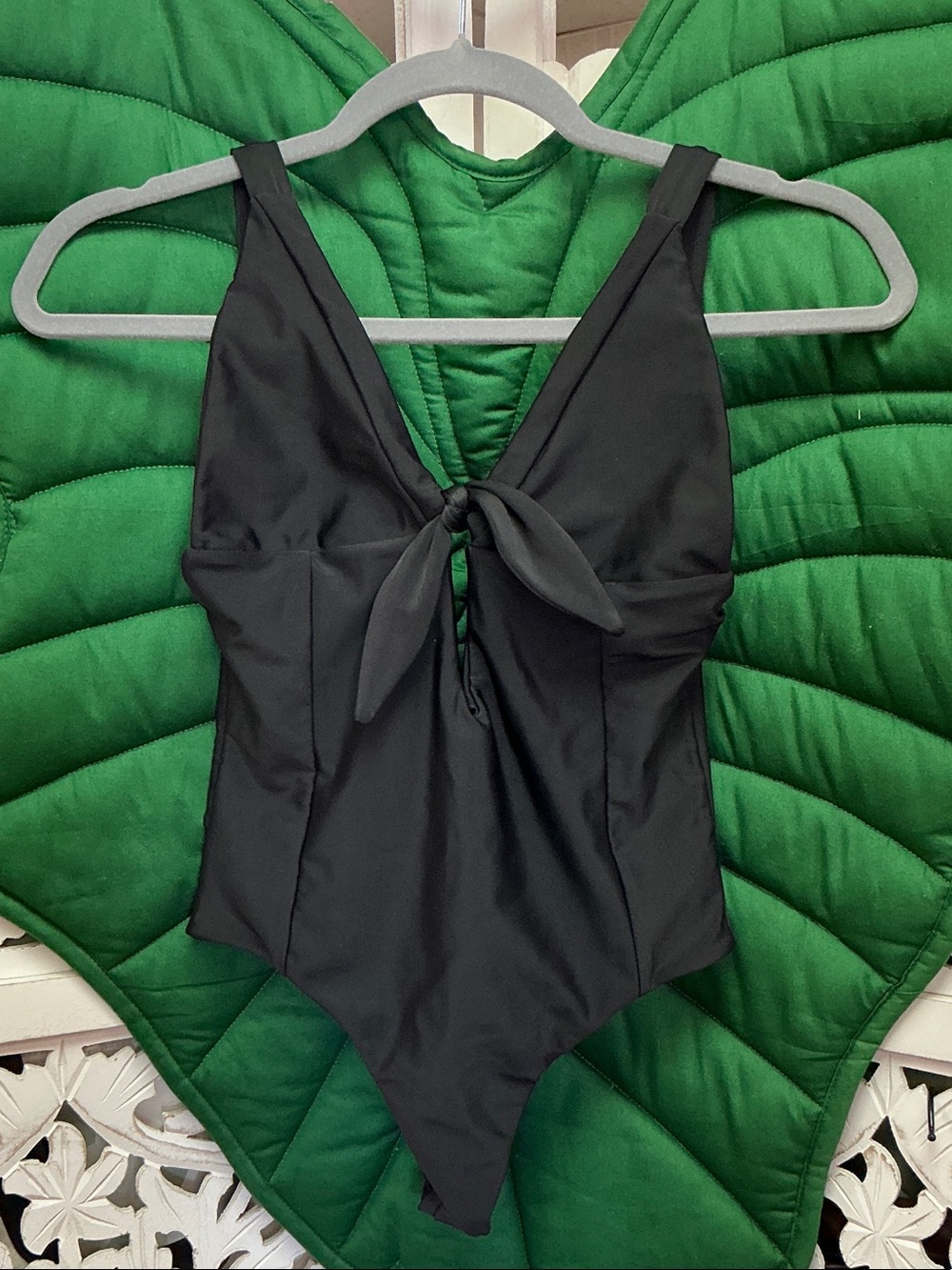 Benoa black one piece swimsuit front bow tie, low V back, size L